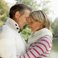 Middle aged couple hugging